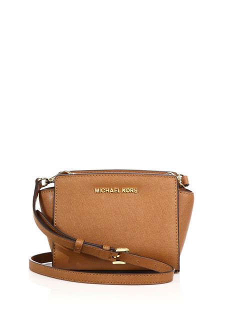 michael kors saffiano leather selma bag brown grommets|selma saffiano leather satchel.